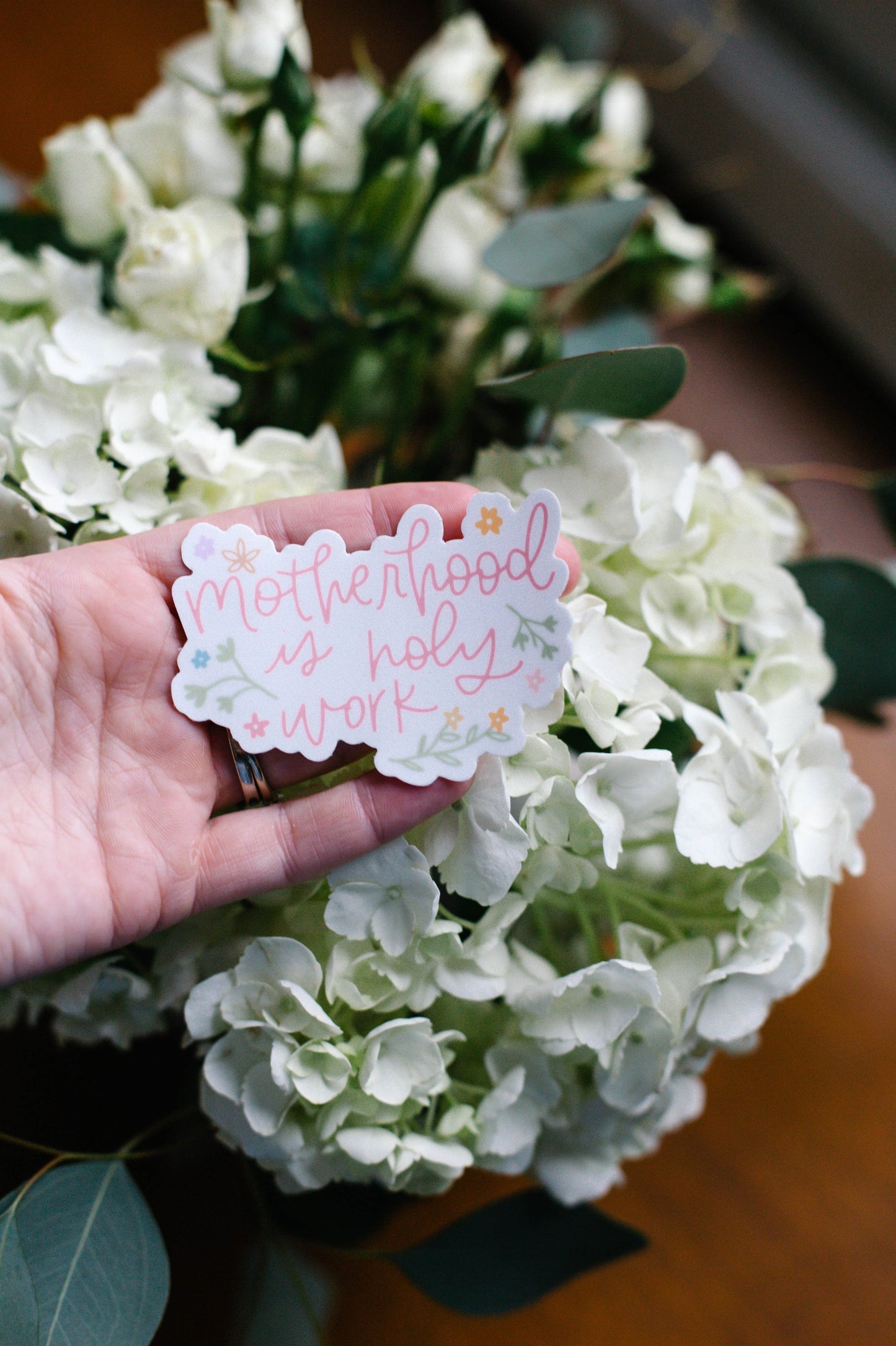 Motherhood is Holy Work Sticker