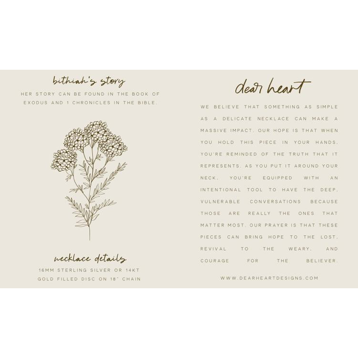 Back of informational card that goes into more detail about the significance and symbolism of the necklace
