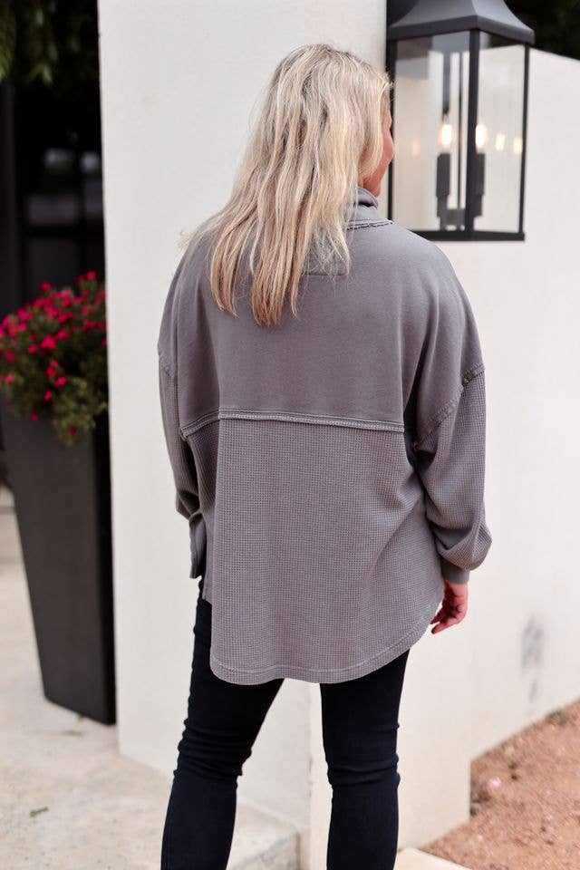 Back View of Jadelyn Brooks Quarterzip Sweatshirt showing longer scooped hem and side split seams