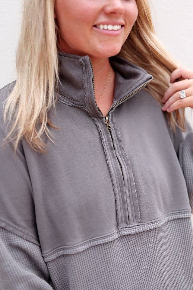 Jadelyn Brooks waffle knit sweatshirt showing brass zipper at front chest and raw hems at collar