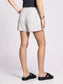 Thread and Supply Jane Shorts in black and white stripe on model with charcoal tank and black strap sandals - back view showing two back pockets