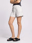 Thread and Supply Jane Shorts in black and white stripe on model with charcoal tank and black strap sandals - side view